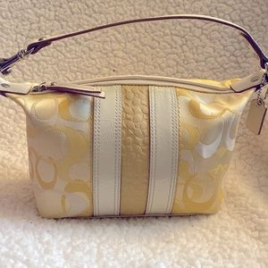 Soft yellow Coach mini bag